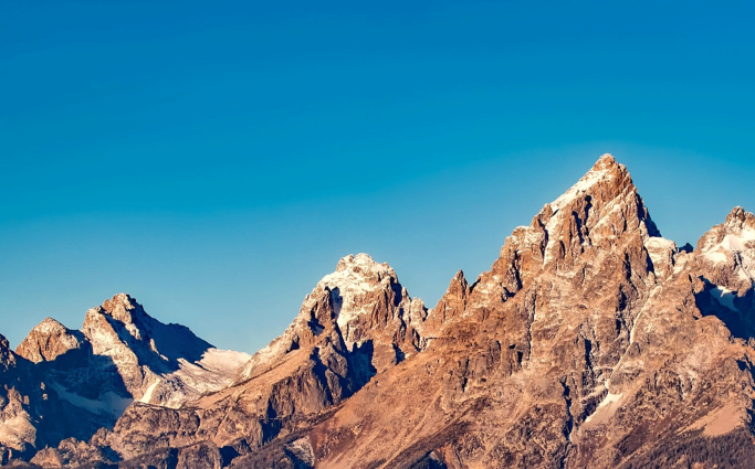 Mountains with blue sky in background