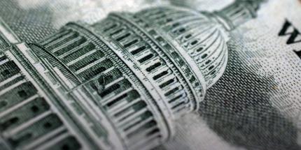 Capital building on dollar bill